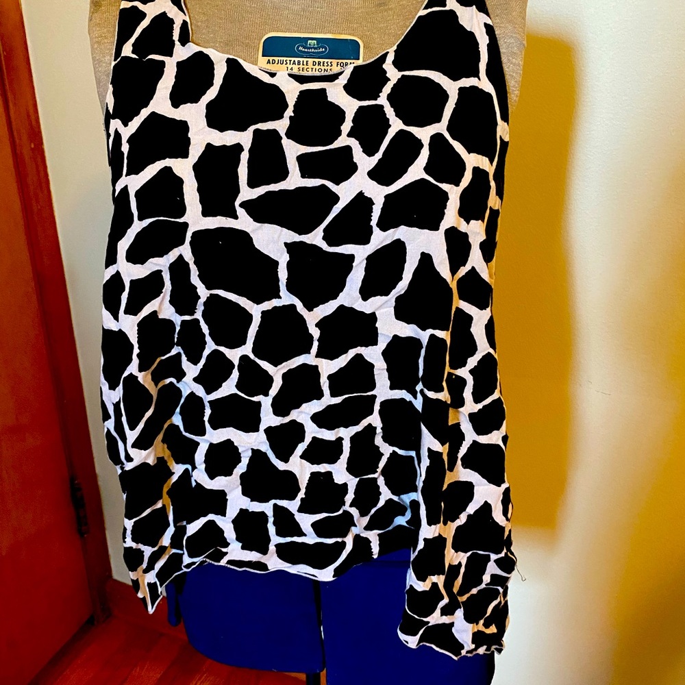 Cute print black and white tank top.  Dressy or casual to make your look.